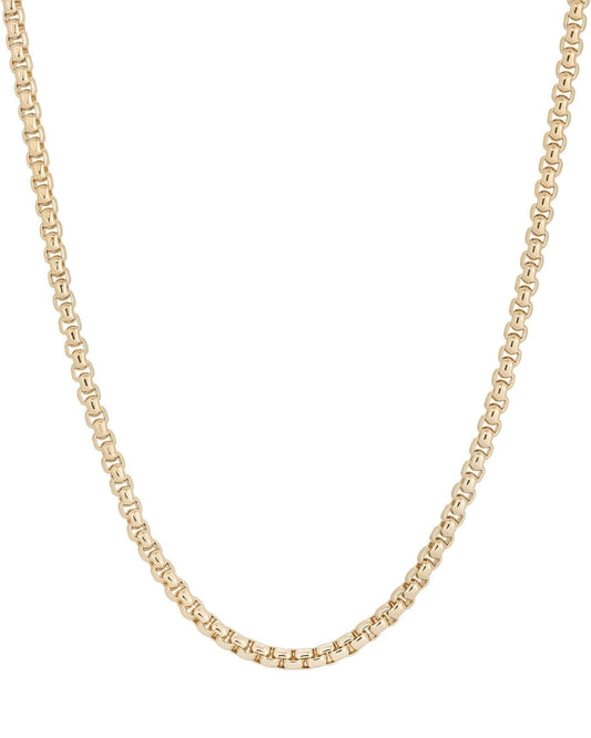 Gold chain necklace on a white background