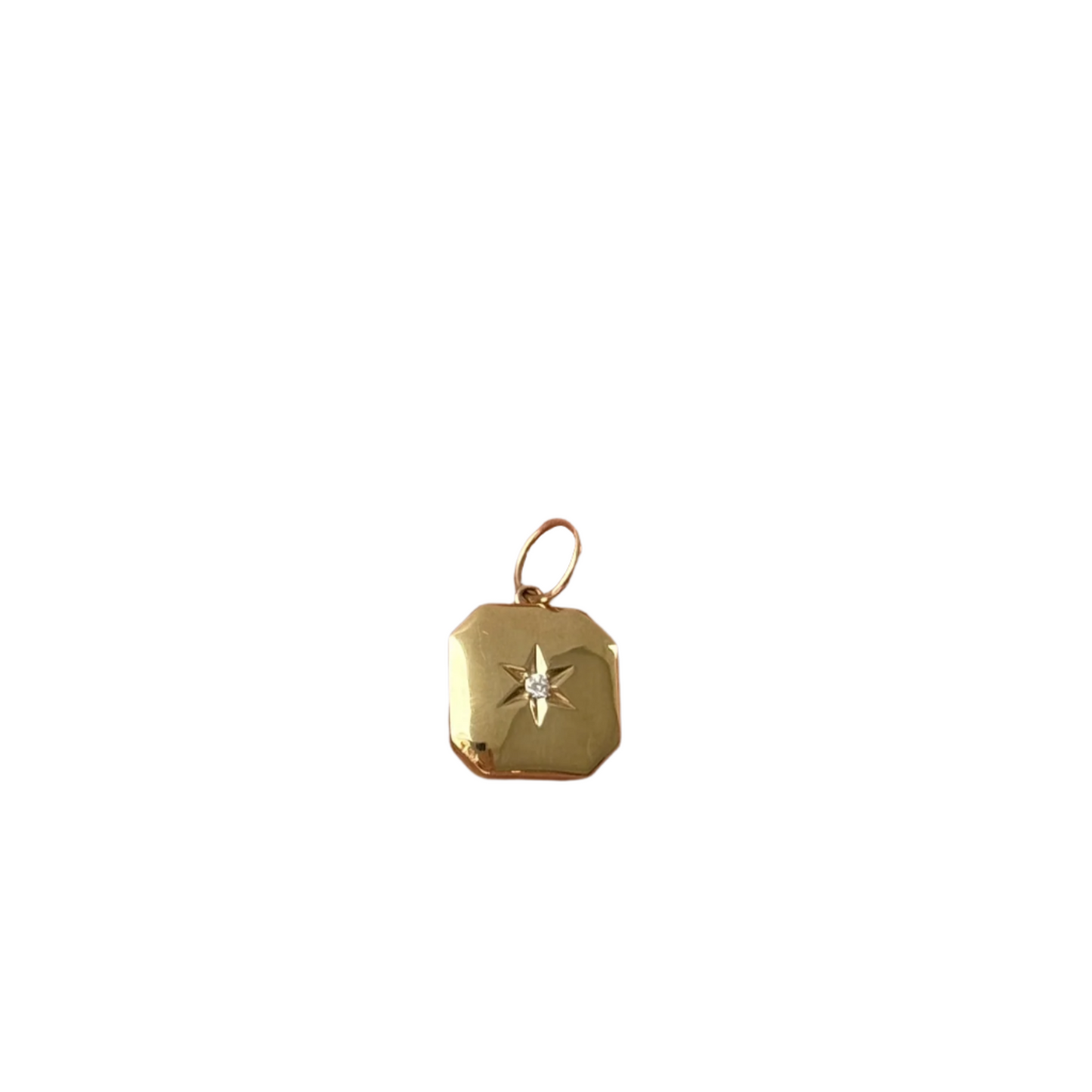 14kt Yellow Gold Square locket with cut corners. Diamond in center. Inside of the locket is engraved the word forever