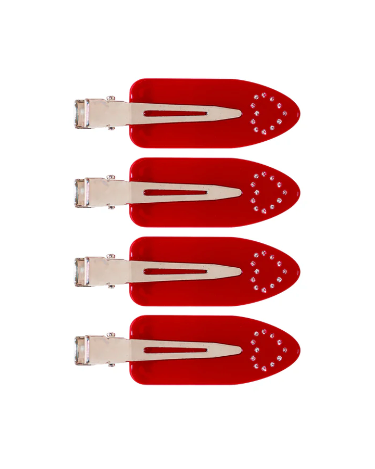 Set of four red hair clips with silver clips on a white background