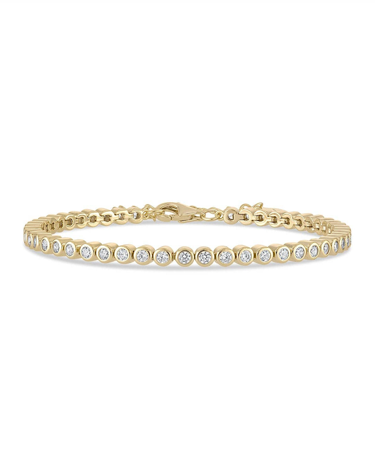 Gold bracelet with diamonds on a white background