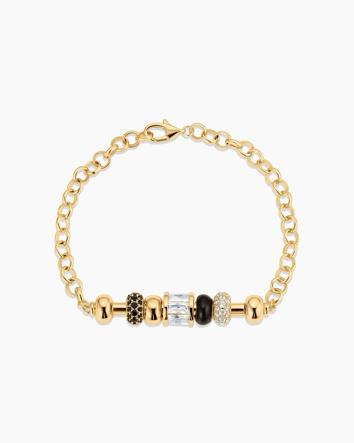 Gold bracelet with various colored beads on a white background