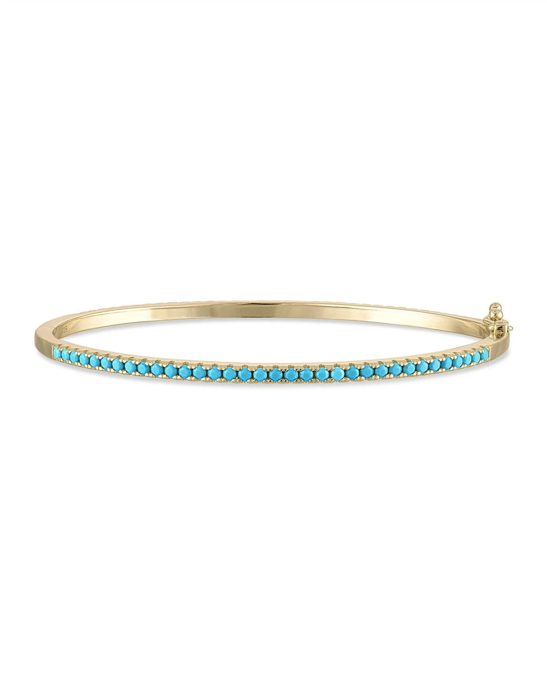 SKN's MARNI Gold Diamond Turquoise Bangle is crafted from yellow gold vermeil and adorned with a row of small turquoise stones along the top, complete with a clasp closure.