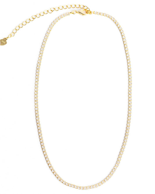 KAYLA Tennis Necklace from Dylan James Jewelry, featuring a gold-plated chain adorned with small cubic zirconia gemstones and an adjustable clasp, displayed on a white background.