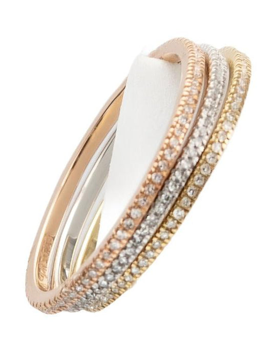 Three intertwined rings made of different metals: one rose gold with diamonds, one yellow gold **DYLANJAMES ADDIE 14kt Diamond Band Ring**, and one plain white 14kt gold ring, displayed on a white stand.