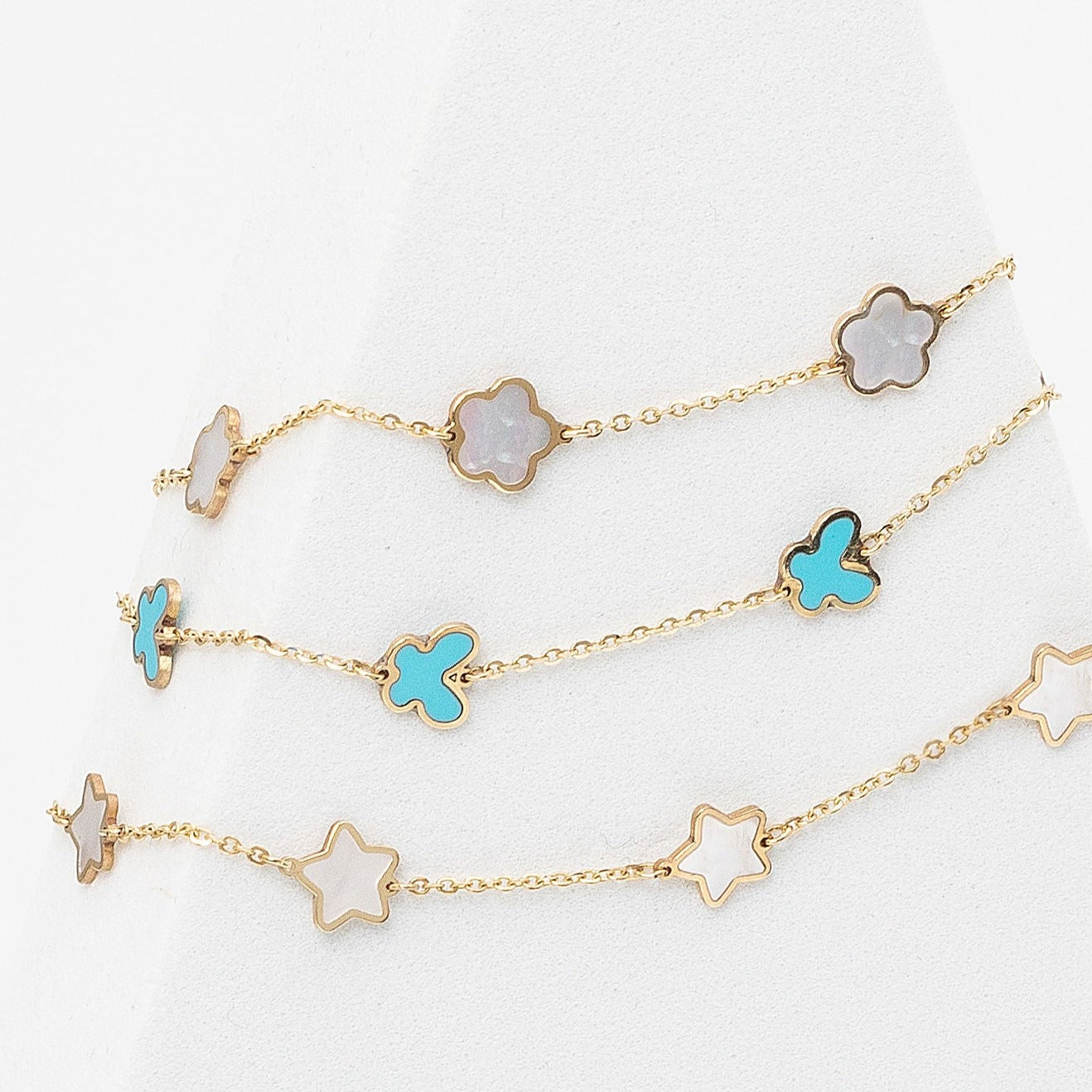 clover ,butterfly and flower shape stone barcelets yellow gold @dylanjamesjewelry.com