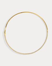 Gold hoop collar necklace on a white background