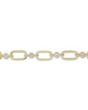 Gold chain bracelet with embedded diamonds on a white background