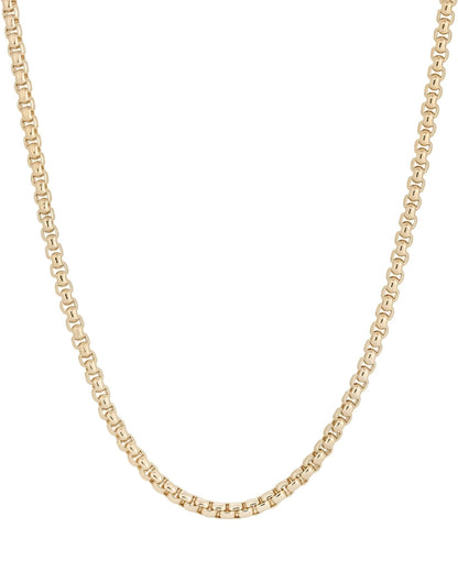 Gold chain necklace on a white background