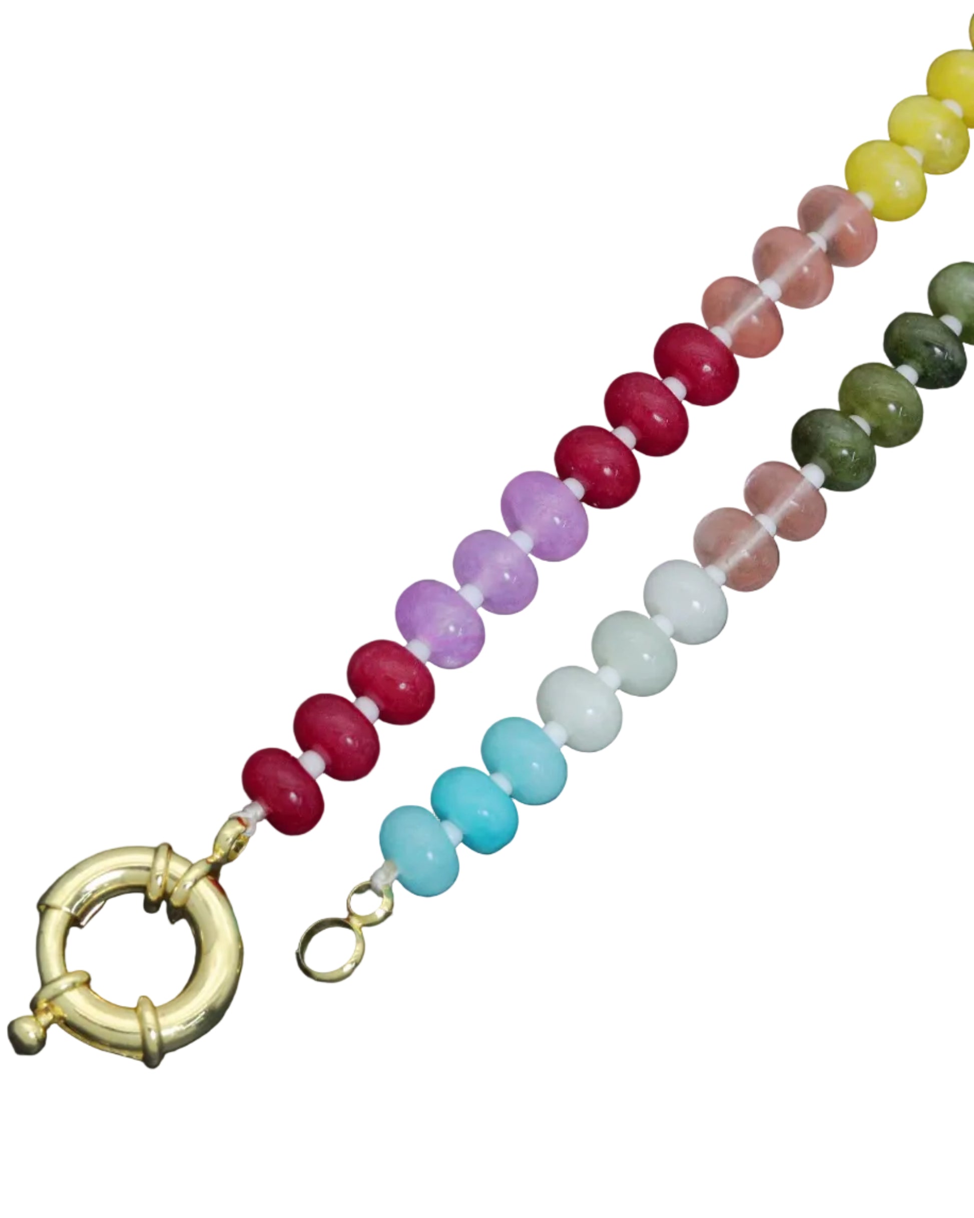 Colorful beaded bracelet with a gold clasp on a dark background
