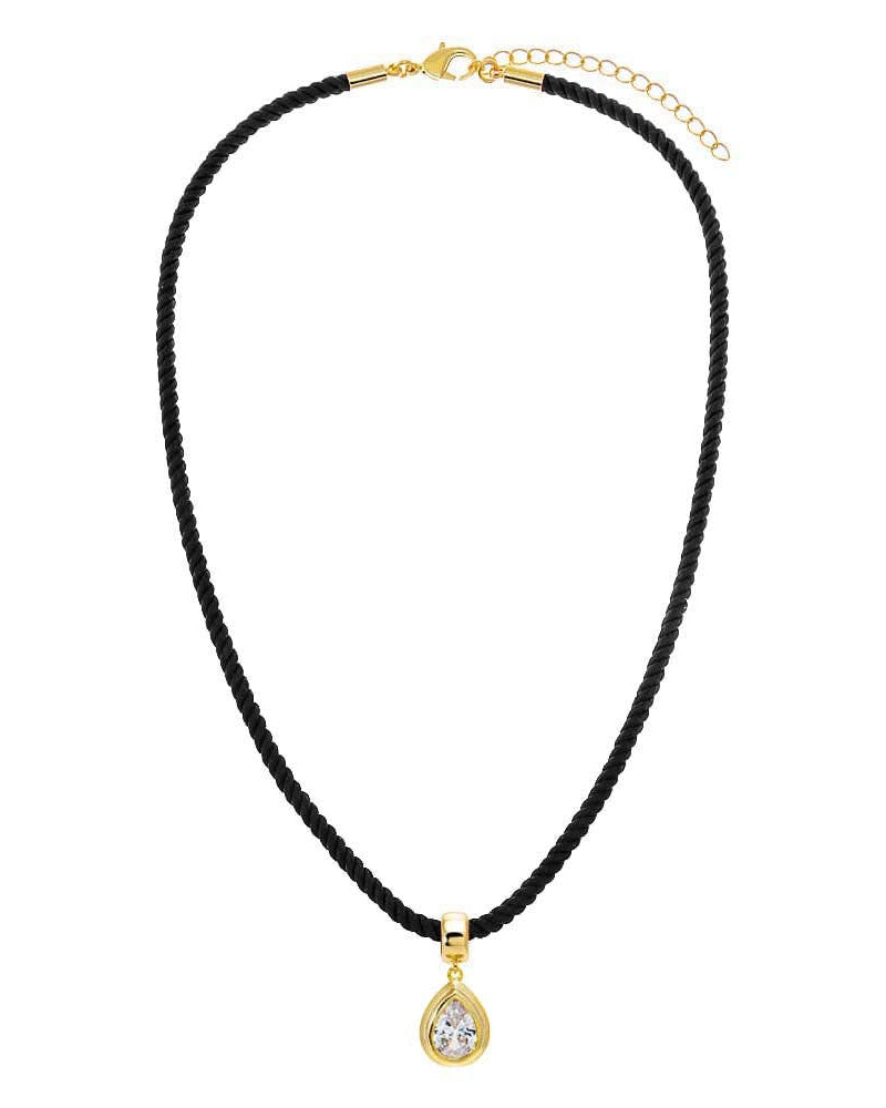 Black beaded necklace with a gold teardrop pendant on a white background