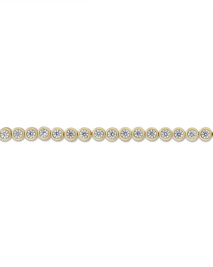 Gold bracelet with diamonds on a white background