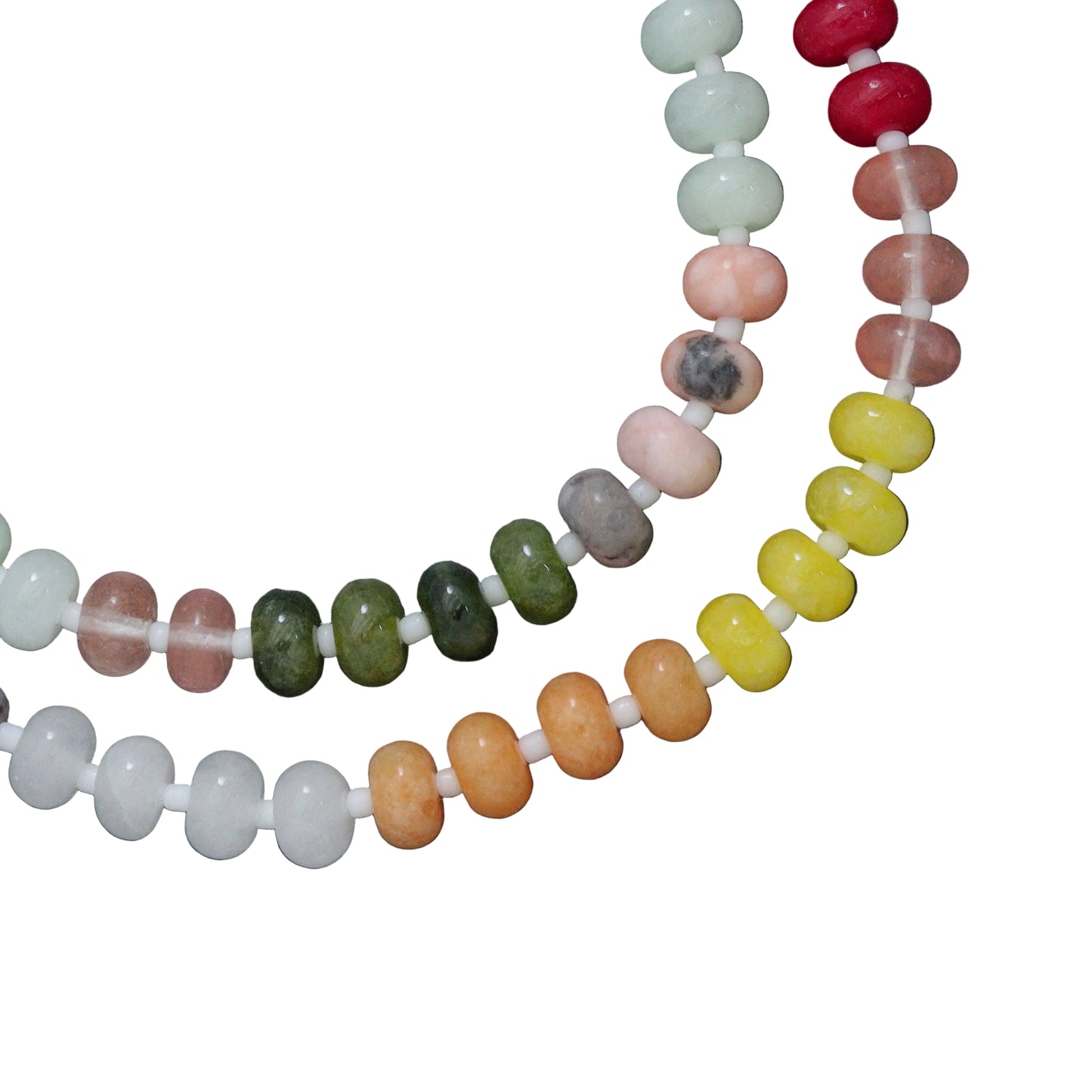 Two beaded necklaces on a dark gray background
