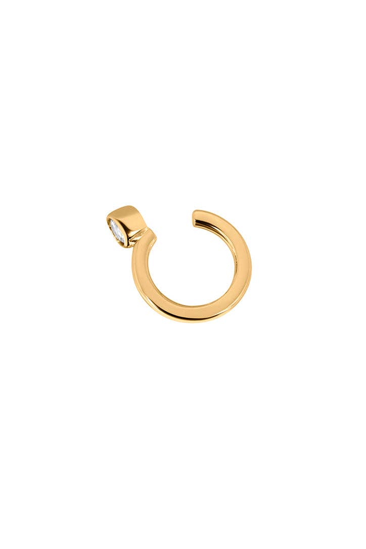 Introducing the REESE Conch Ear Cuff by Lili Claspe, featuring a gold-plated brass design with a horseshoe shape and accented by a small circular CZ stone at the tip.