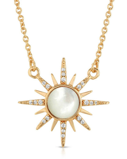Shine with the ELIZABETH STONE Gem Starburst Necklace by Elizabeth Stone Jewelry, featuring a 14k gold-plated sunburst pendant with a luminous central pearl and sparkling stones.