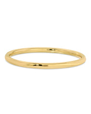 A gold-plated brass hollow tube bangle bracelet with a polished finish.