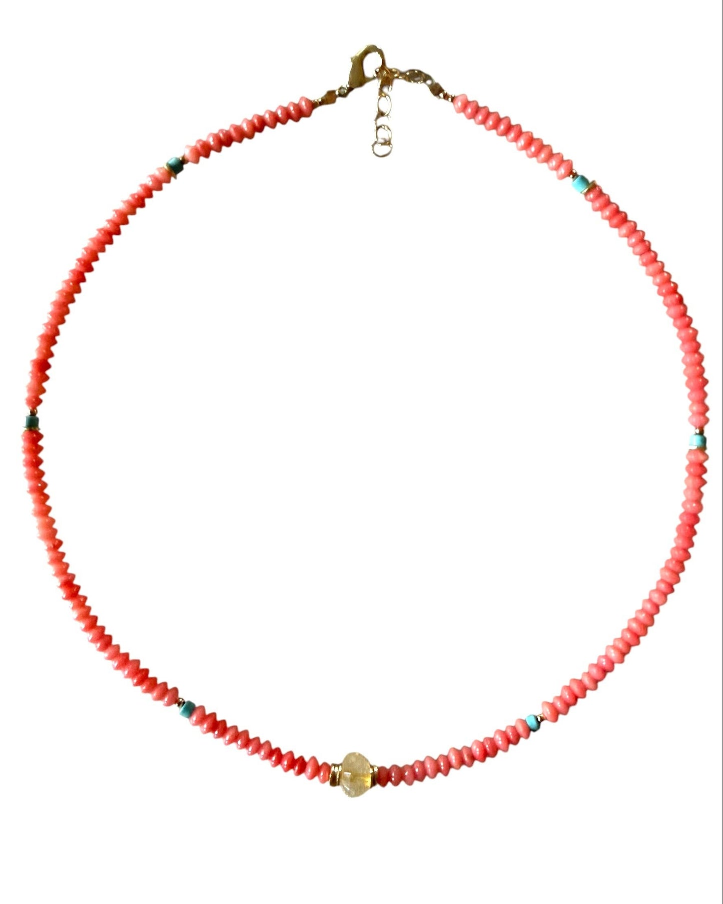 Necklace with red beads on a white background