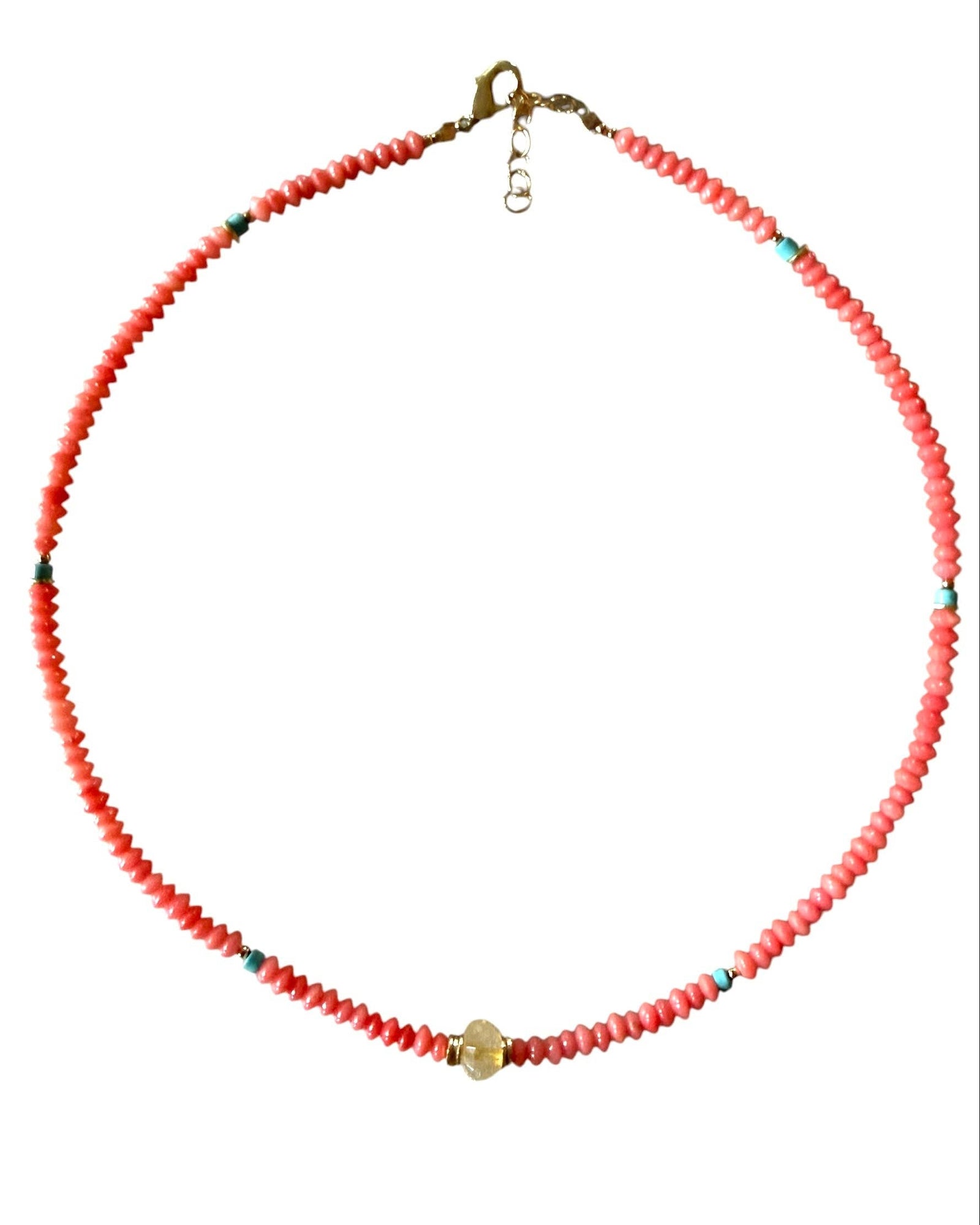 Necklace with red beads on a white background