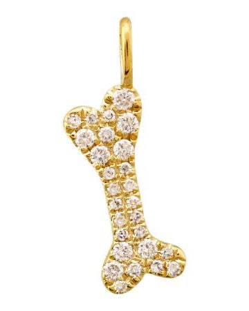 Gold pendant shaped like a bone with embedded diamonds on a white background