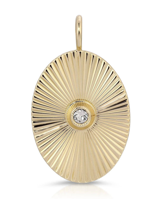 Gold pendant with a diamond on a white background
