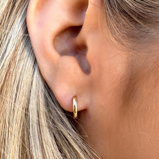 14kt gold huggy earrings small hoop  @dylanjamesjewelry.com