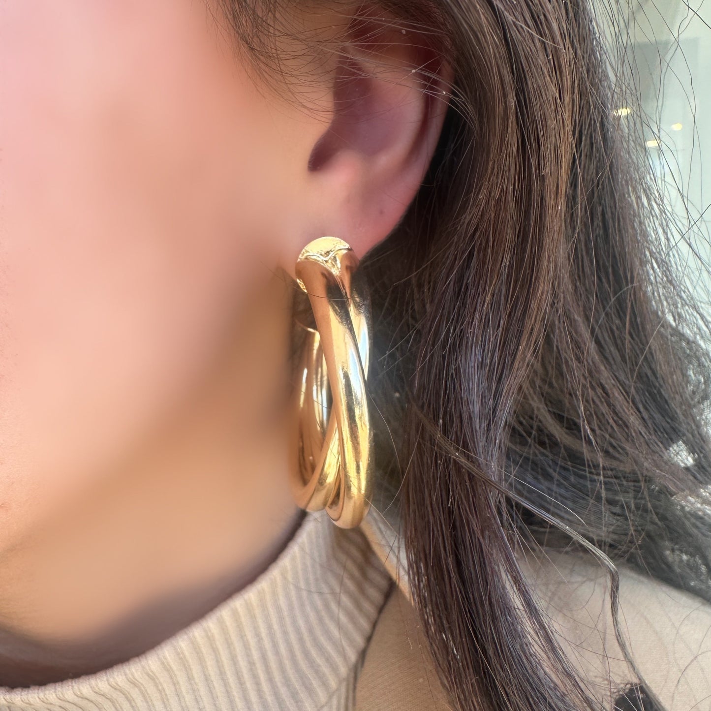 Large gold hoop earrings @dylanajmesjewelry.com