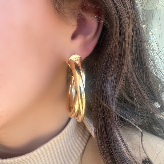 Large gold hoop earrings @dylanajmesjewelry.com