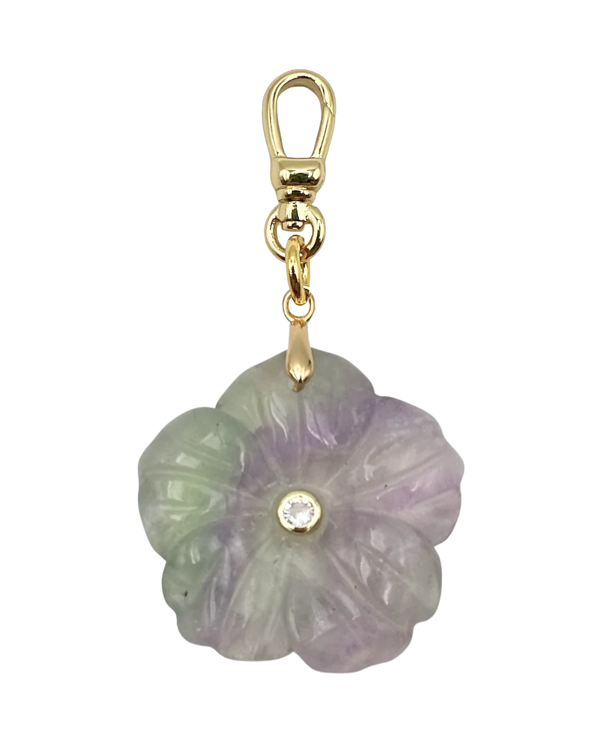 Flower-shaped jade pendant with gold clasp on a white background