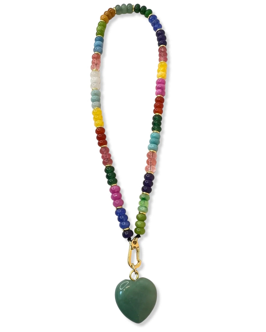 Colorful beaded necklace with a green heart pendant on a white background
