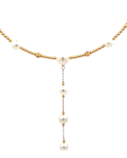 Gold necklace with pearl beads laariet design. On yellow gold beaded bendy comfortable wire,