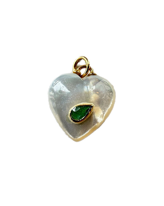 Heart-shaped pendant with a green gemstone on a white background
