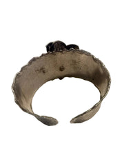 Metallic ring on a white surface