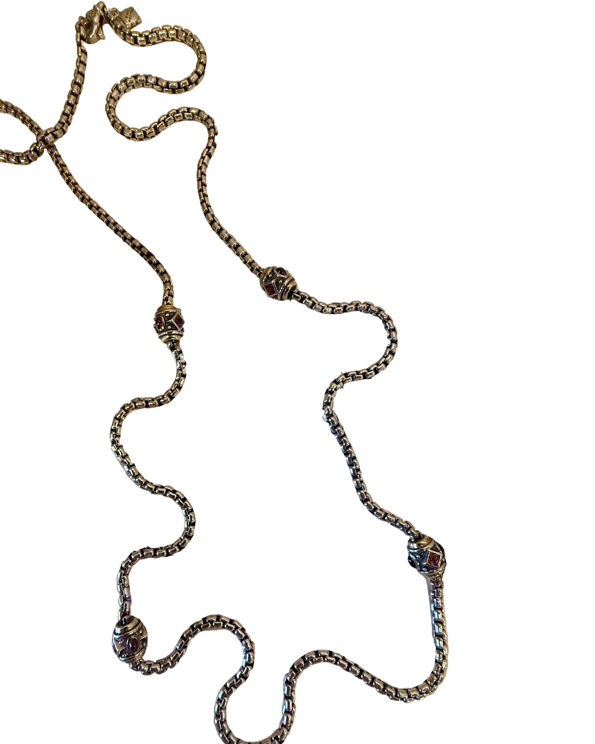 Silver chain necklace on a Beatles album cover