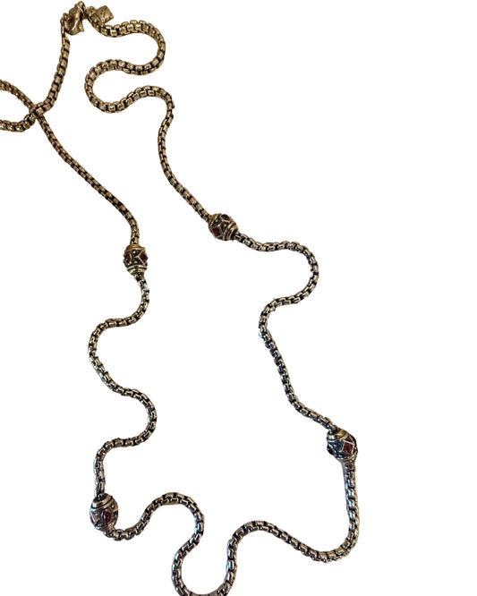 Silver chain necklace on a Beatles album cover