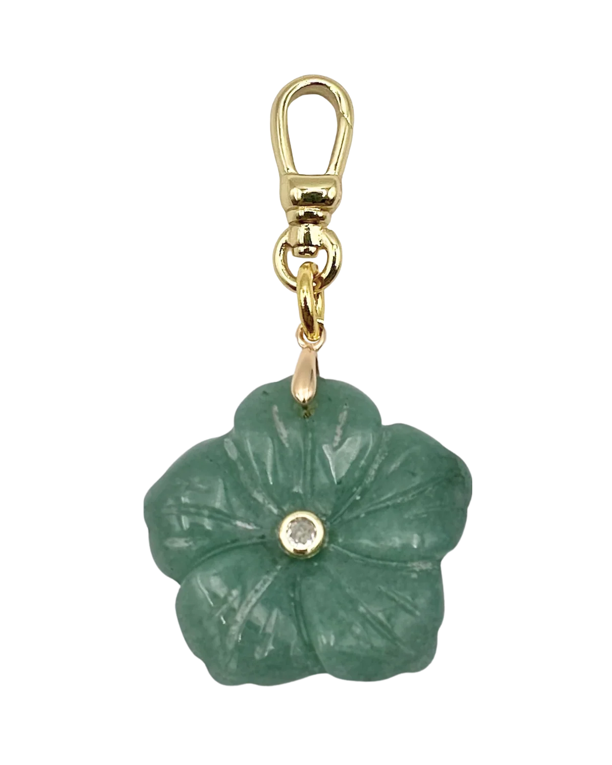 Green flower-shaped pendant with gold chain on a white background