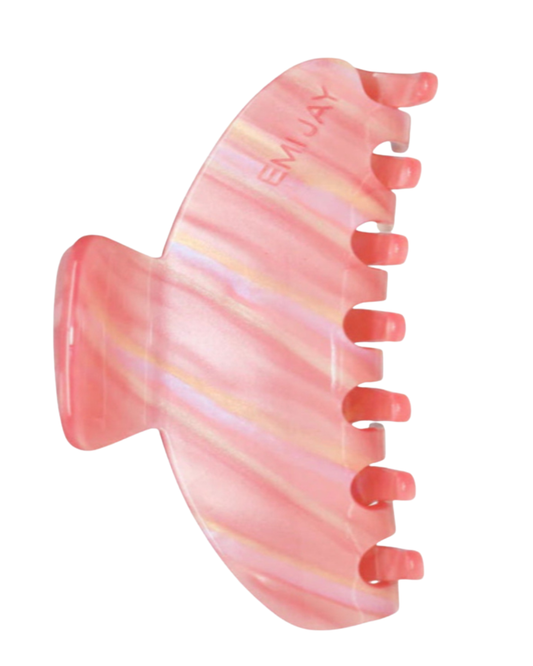 Pink and orange hair clip on a white background