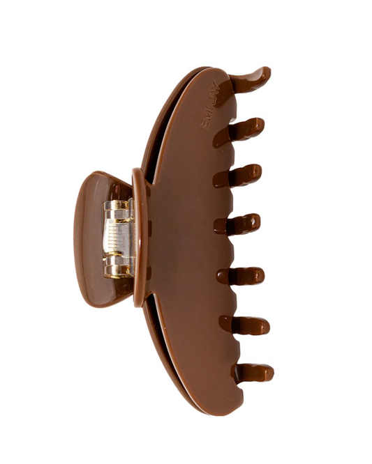 Brown hair clip on a white background