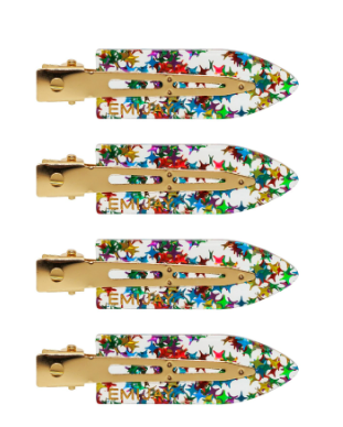 Set of five floral-patterned hair clips with gold hardware on a white background