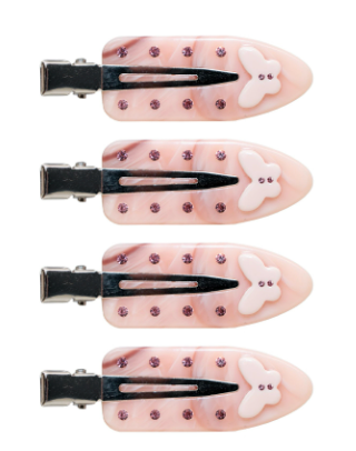 Set of four pink hair clips with black clips and white bunny designs on a white background