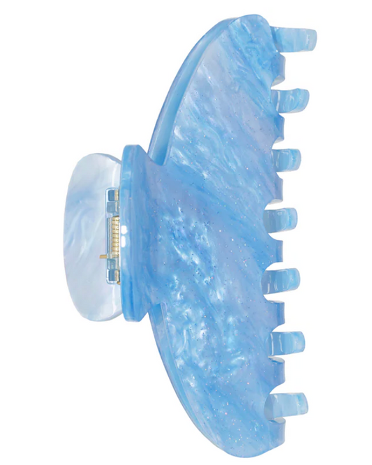 Blue hair clip on a white background