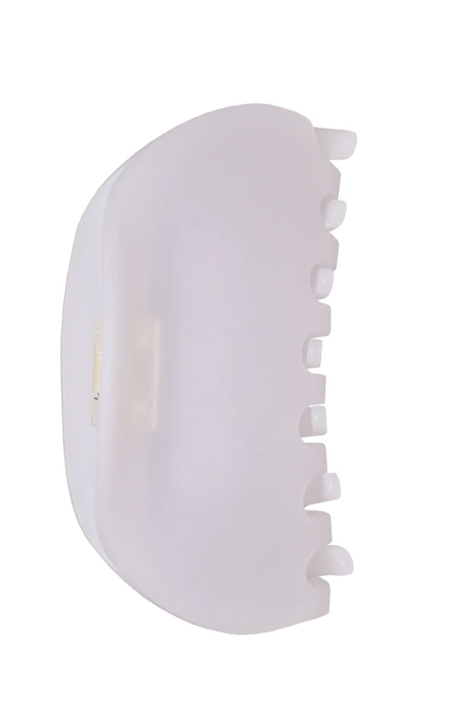 White hair clip on a white background