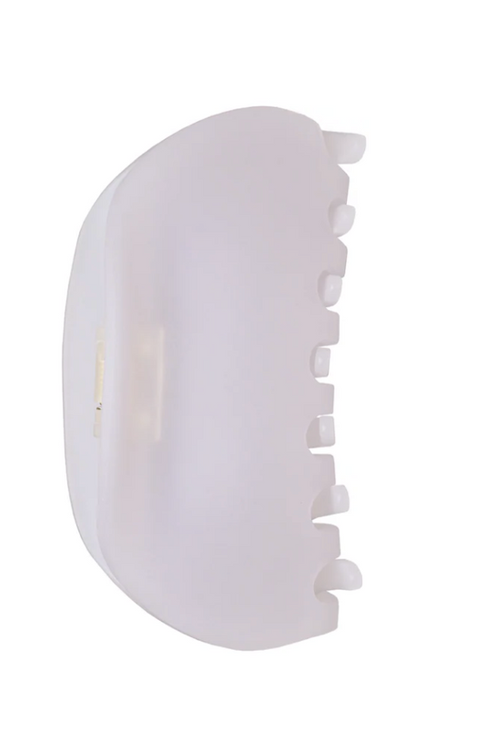 White hair clip on a white background