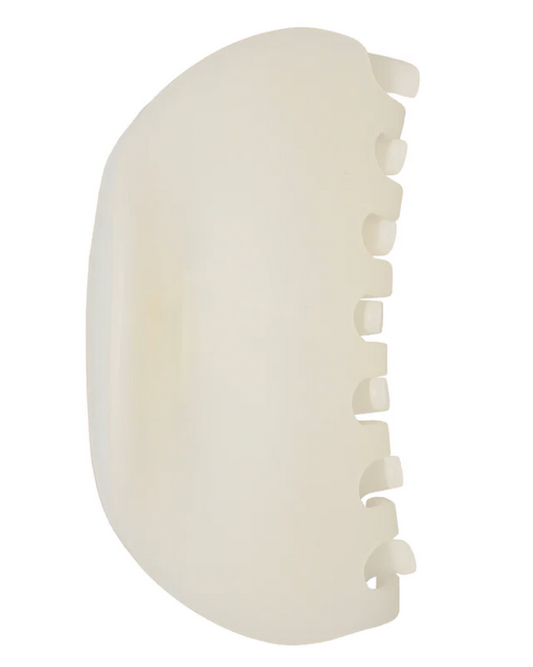 White hair clip on a white background