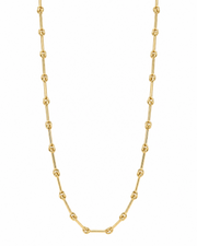 A gold ball chain necklace with polished metallic links, displayed in a U-shape against a solid white background.