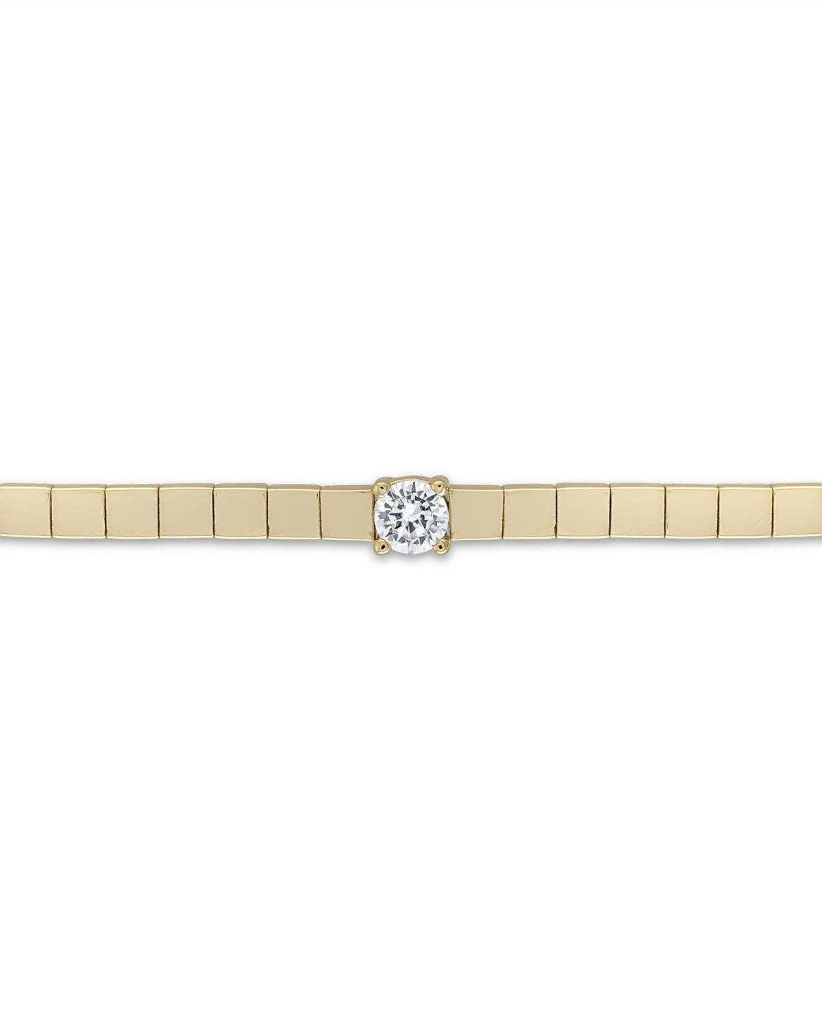 Gold bracelet with a diamond on a white background