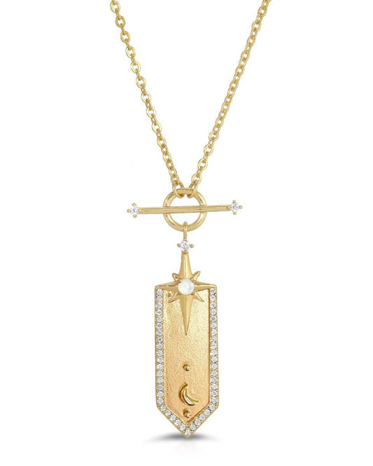 Gold necklace with a detailed pendant on a white background