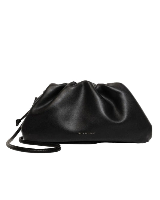 Black handbag with a strap on a white background