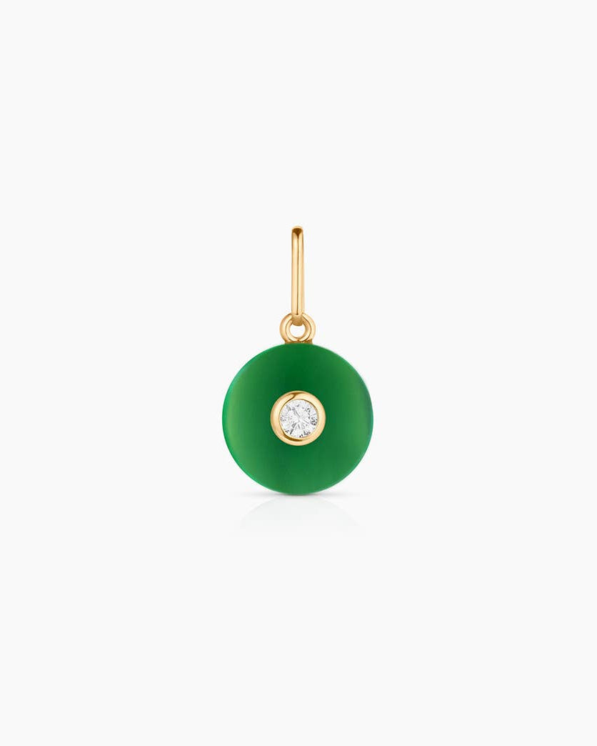 Green pendant with gold chain on a white background