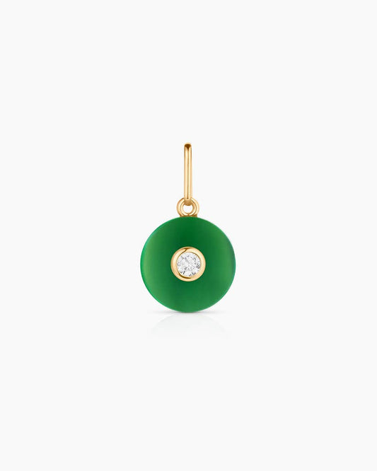 Green pendant with gold chain on a white background