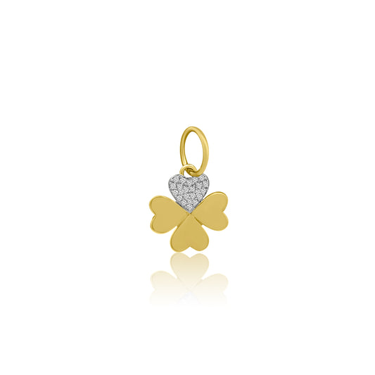 Introducing the CLOVER Gold Diamond Charm by Dylan James Jewelry: A stunning yellow gold charm featuring a unique clover shape, adorned with an engraved heart embellished with diamonds, and complete with a circular loop for easy attachment.