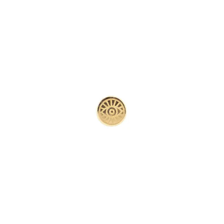 Close-up image of the SNAKE Mini Flat Back Stud by Porter Lyons, a small, round golden object featuring a detailed sunburst pattern and an eye design in the center. Crafted from 14kt yellow gold, this exquisite piece by PORTER LYONS shines brilliantly against a plain white background.